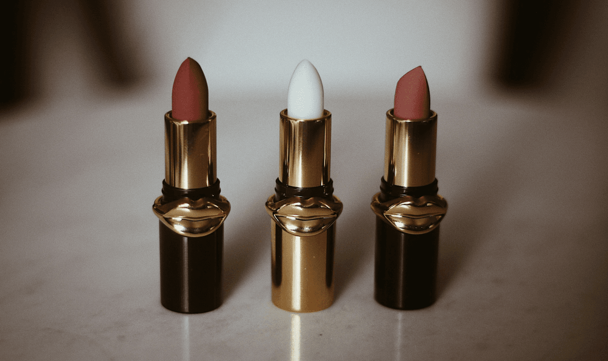 Three lipsticks of varying colors